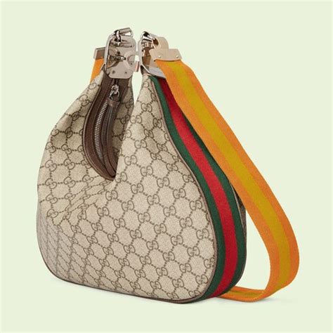 gucci attache medium shoulder bag.